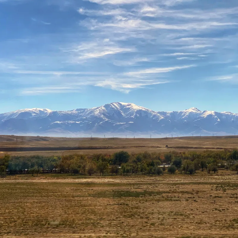 Mountain range beyond an open plain
